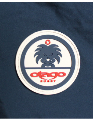 Ecusson Otago cousu côté coeur de doudoune Limbo Otago bleu marine pour homme