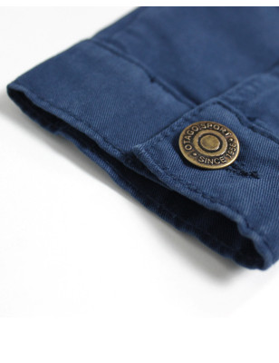 bouton métallique gravé du blouson Brookly indigo marine