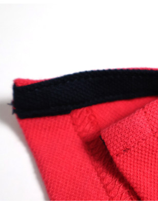 patte d'ouvertures latérales du Polo manches courtes Lorenzo Otago rugby corail pour homme
