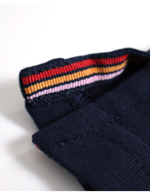 patte d'ouverture latérale du Polo manches courtes Pacitort Otago rugby bleu marine pour homme